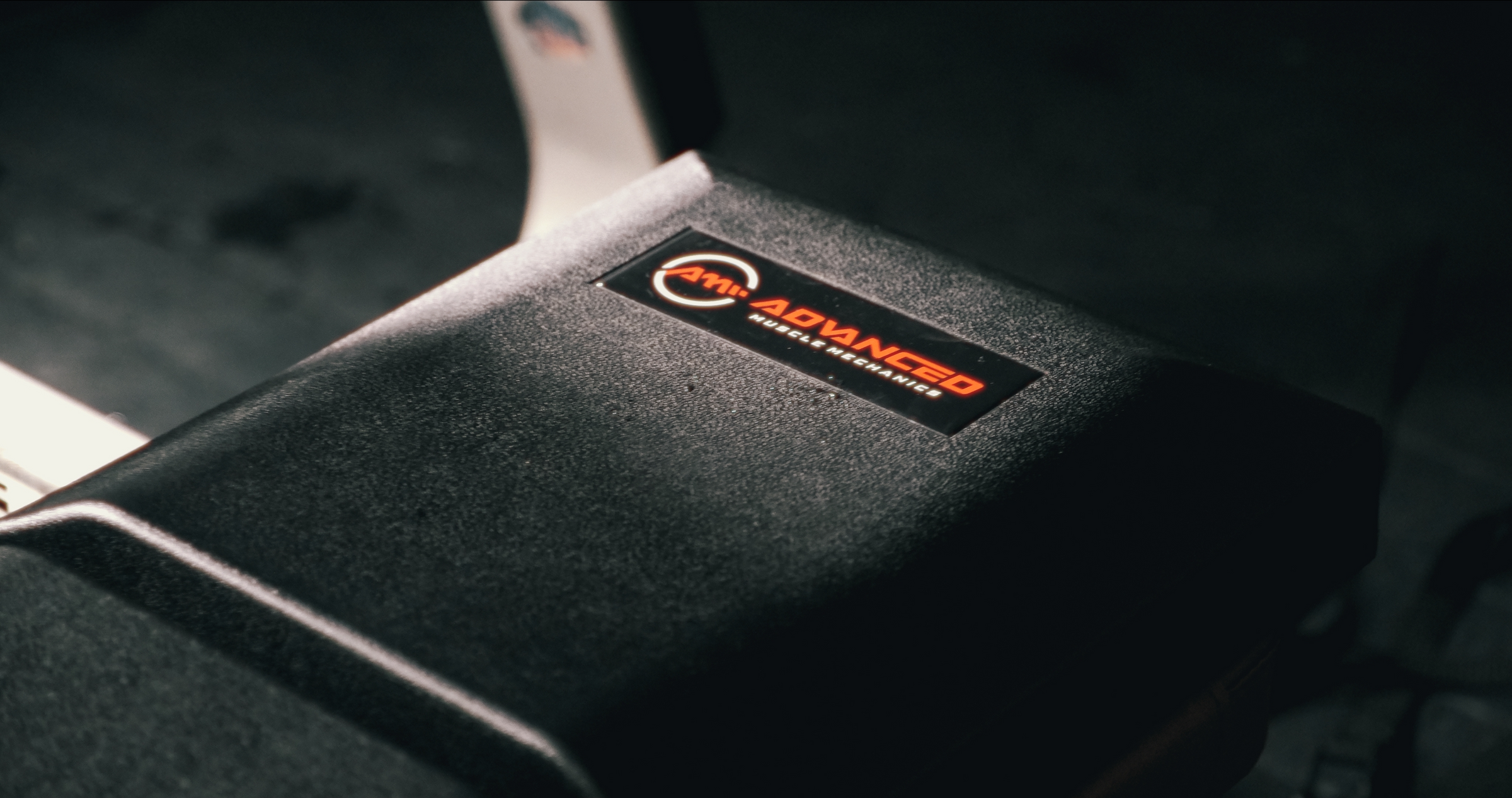 Close-up view of Advanced Muscle Mechanics Launch Pad, highlighting the durable construction and branding for optimized strength training.