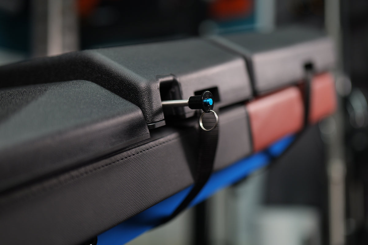 Close-up of The Launch Pad adjustable support with its pull pin visible in an extended position.