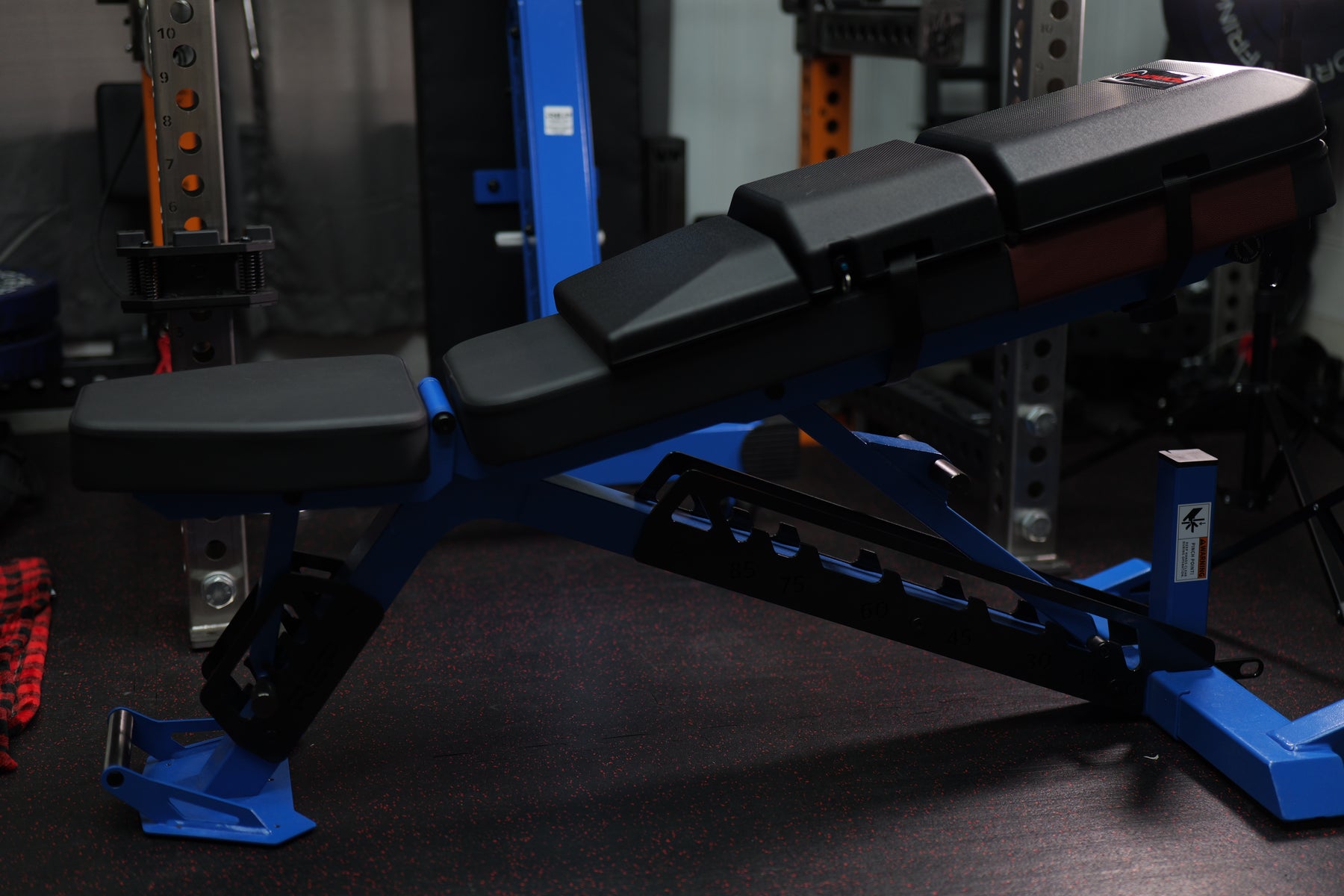 Side view of The Launch Pad® Gen II on an adjustable bench set to incline.