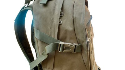 Close-up of the side compression strap and zipper on the unbraded tactical backpack, showcasing adjustable support, durable stitching, and reinforced seams for heavy-duty use.