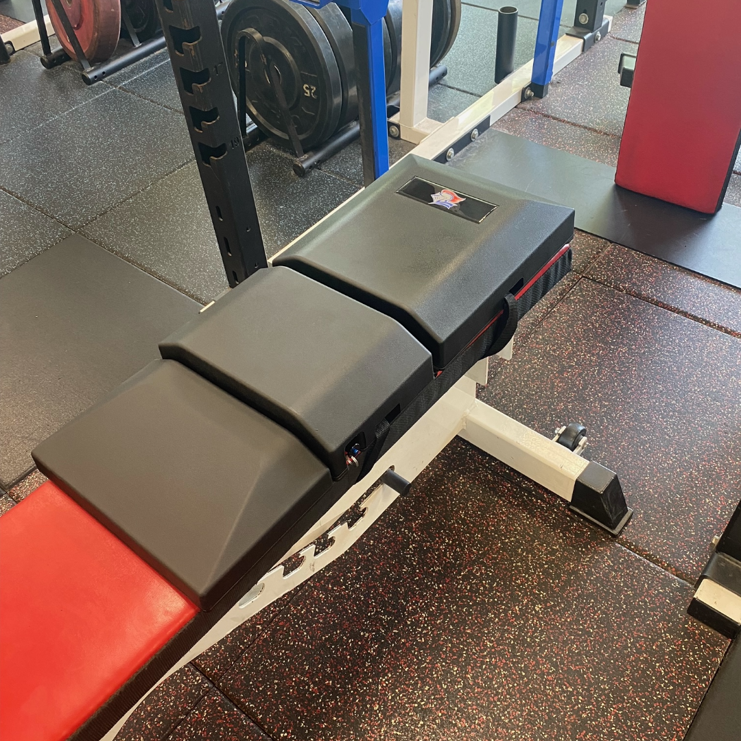 Side view of St. Frances Knights custom Launch Pad™ securely attached to an adjustable bench, designed for improved stability and joint protection.