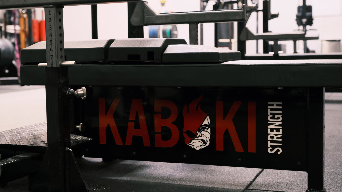 The Launch Pad™ positioned on a Kabuki Strength bench, offering enhanced support, stability, and range of motion for optimized strength training.