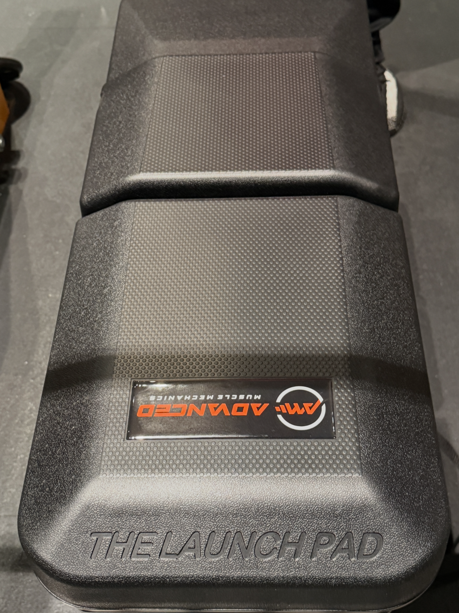 The Launch Pad’s contoured support surface resting directly on the gym floor
