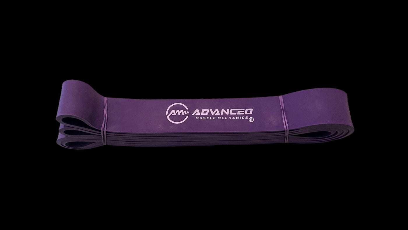 Purple resistance band from Advanced Muscle Mechanics, ideal for strength training, flexibility, and mobility exercises.